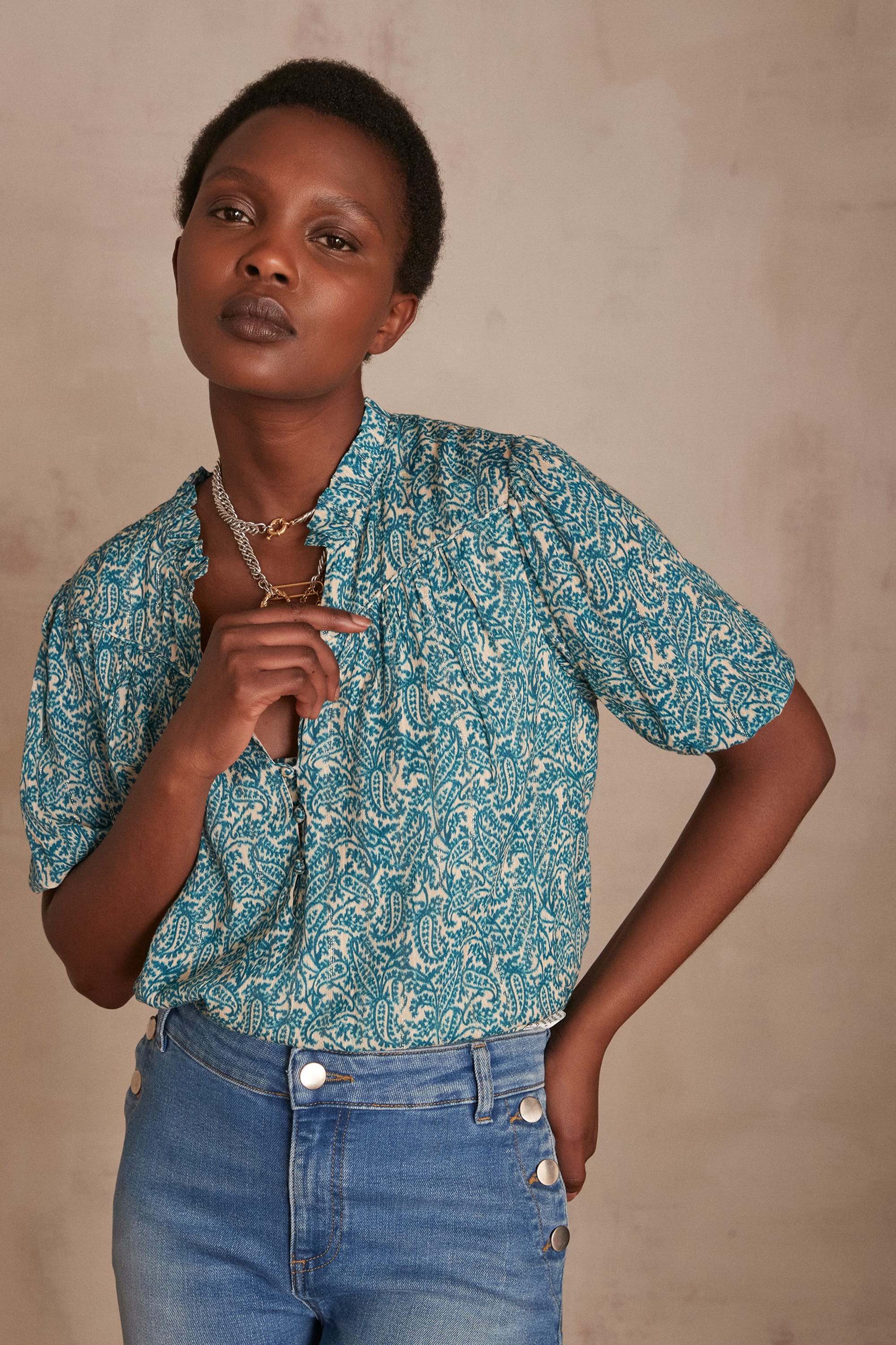 teal blue blouse